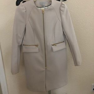Coat with gold accents